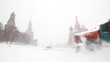 units move near Moscow Kremlin, remove snowfall with plows