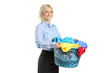 Young smiling woman holding a laundry basket