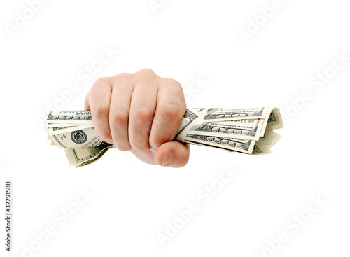 Photo: American dollars clenched American dollars clenched