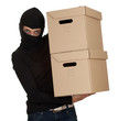 female thief in black clothes and balaclava with boxes