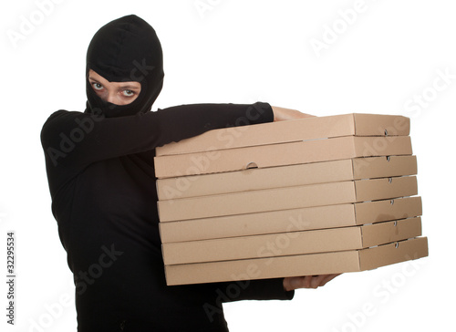 Photo: female thief in balaclava with boxes of pizza female thief in balaclava with boxes of pizza