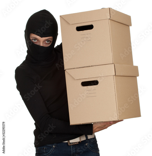 Photo: female thief in black clothes and balaclava with boxes female thief in black clothes and balaclava with boxes
