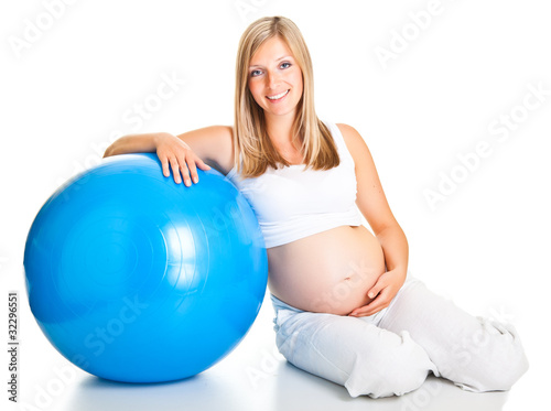 Foto: Pregnant woman excercises with gymnastic ball Pregnant woman excercises with gymnastic ball