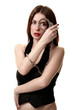Young saxy brunette in handcuffs