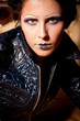 Photo: Portrait of vampire girl with deep purple dramatic make-up Portrait of vampire girl with deep purple dramatic make-up