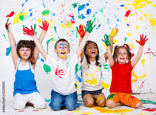 Photo: Kids with their palms and clothing painted Kids with their palms and clothing painted