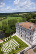 Rooftop of large estate and formal garden, Bourdeilles, Dordogne, France