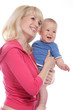 happy mother and baby over white