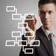 young businessman drawing diagram