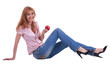 tall mature woman in jeans sit with apple tall mature woman in jeans sit with apple