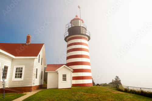 Photo: West Quoddy lighthouse on northern Atlantic coastline of Maine West Quoddy lighthouse on northern Atlantic coastline of Maine