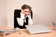 Young businesswoman screaming