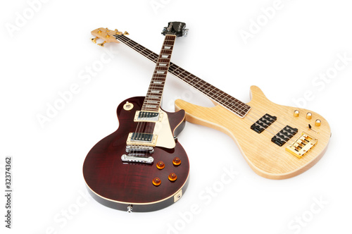 Photo: Musical guitar isolated on the white background Musical guitar isolated on the white background