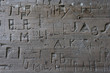 Carved names on pew in old church