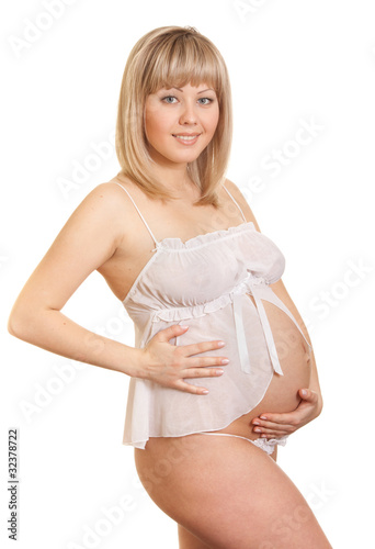 Photo: Young happy mother in white lingerie isolated Young happy mother in white lingerie isolated