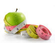 green apple with measure tape