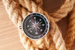 Compass and rope in travel and adventure concept