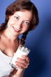 woman enjoying a glass milk