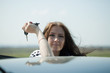 woman holding keys to new car woman holding keys to new car