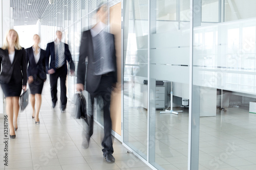 Photo: Businesspeople in corridor Businesspeople in corridor