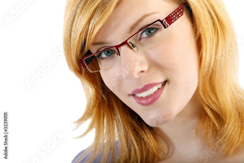 Foto: young woman with eyeglasses (white background) young woman with eyeglasses (white background)
