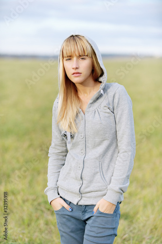 Photo: Beautiful girl in jacket with hood Beautiful girl in jacket with hood