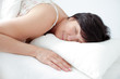 Charming lady sleeping on her pillow