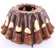 Bundt Cake, covered with chocolate and sprinkles Bundt Cake, covered with chocolate and sprinkles