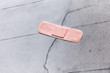 Plaster on a broken wall, symbolic