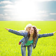 Woman and child having fun in summer field Woman and child having fun in summer field