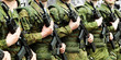 Photo: Military uniform soldier row Military uniform soldier row