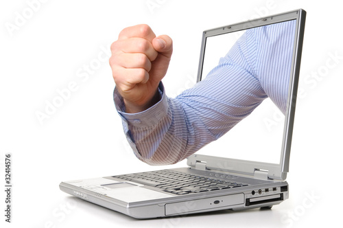 Foto: Fist strikes from the computer Fist strikes from the computer