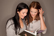 Foto: reading a book together reading a book together