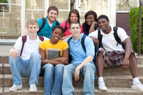 Photo: Multicultural College Students outside on campus Multicultural College Students outside on campus