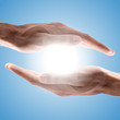 hands holding sun