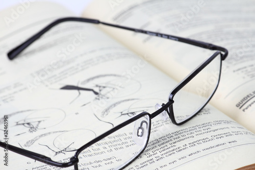 Photo: Eyeglass and Old Book Eyeglass and Old Book