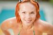 Smiling woman in bikini in pool