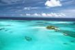 The caribbean ocean, sandbars and islands.