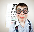 person wearing spectacles in an office at the doctor
