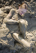 Beautiful girl struggling in the mud Beautiful girl struggling in the mud