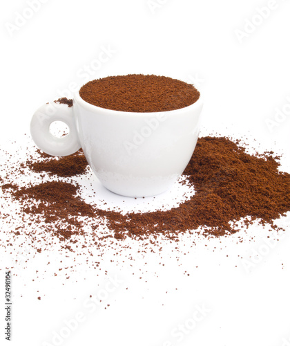 Photo: Cup of coffee with spilled coffee Cup of coffee with spilled coffee