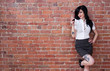 Tattooed girl with a glass of red wine Tattooed girl with a glass of red wine