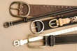 Photo: belts on cardboard background belts on cardboard background