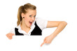 Woman pointing at a blank board