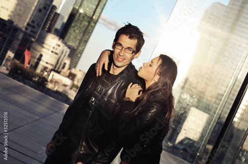 Photo: Cute young handsome couple posing Cute young handsome couple posing