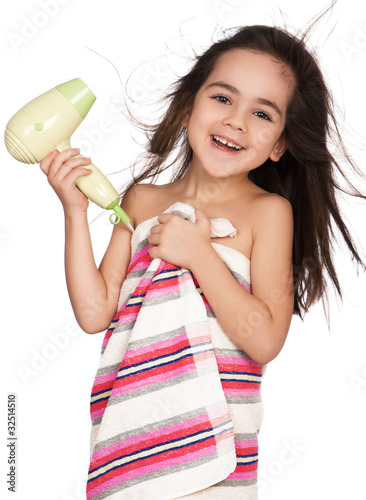 Foto: Little girl with hairdryer Little girl with hairdryer