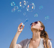 Foto: Blowing bubbles into the sky. Blowing bubbles into the sky.