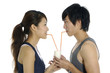 close up young love couple drinking milk.