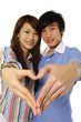 Young couple heart shape of hands