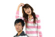 Young couple standing together smiling